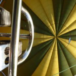 What you see when you look up during your balloon ride. The balloon silk is green and white, in the front you see a metallic gas burner.