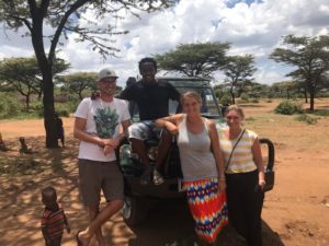 Maike, Niels and Namayiana staff Mpairo and Corinna in front of Landcruiser